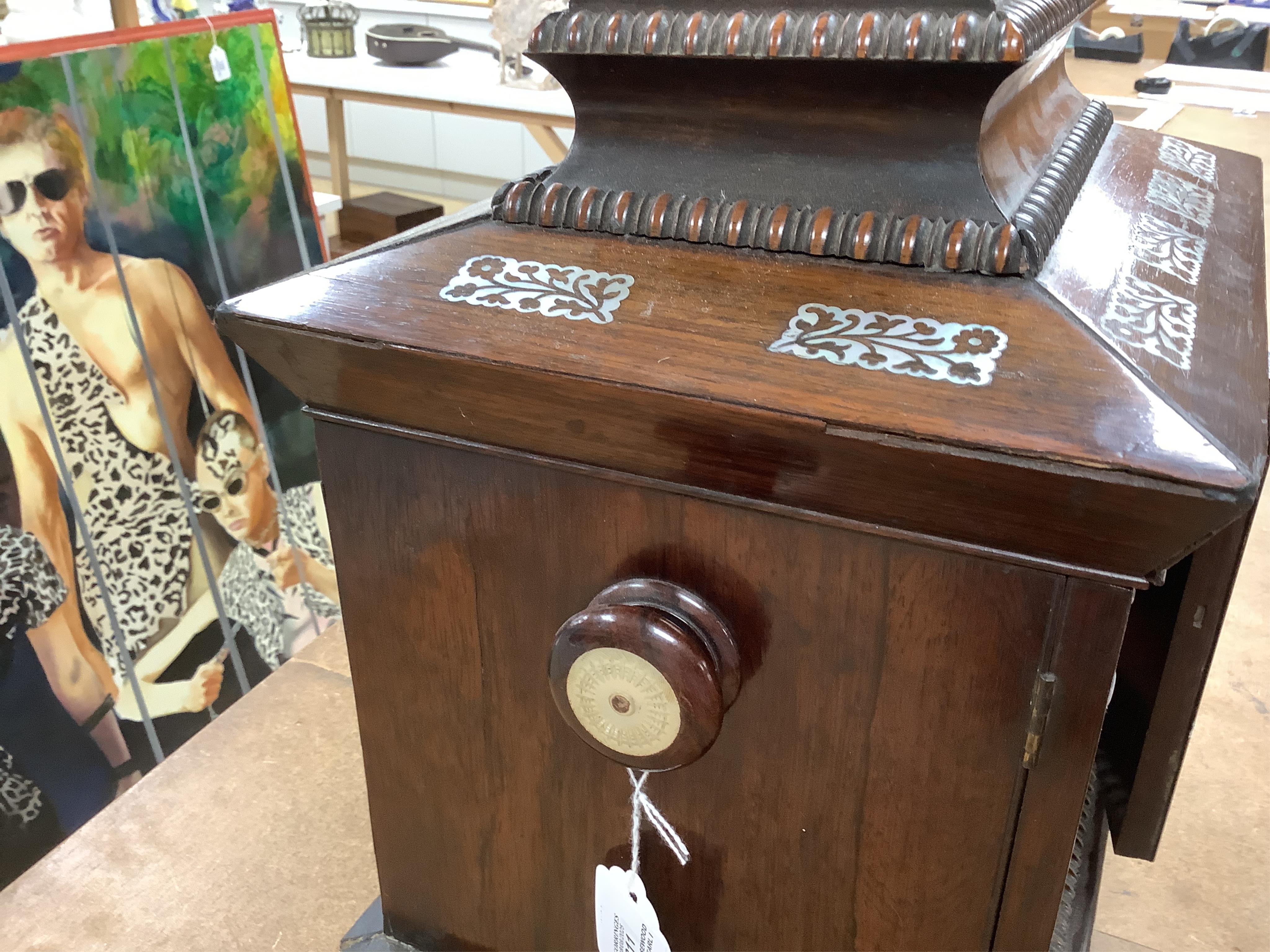 A William IV rosewood and mother of pearl inlaid sewing and writing cabinet with tooled Moroccan leather fitted interior, 37cm high